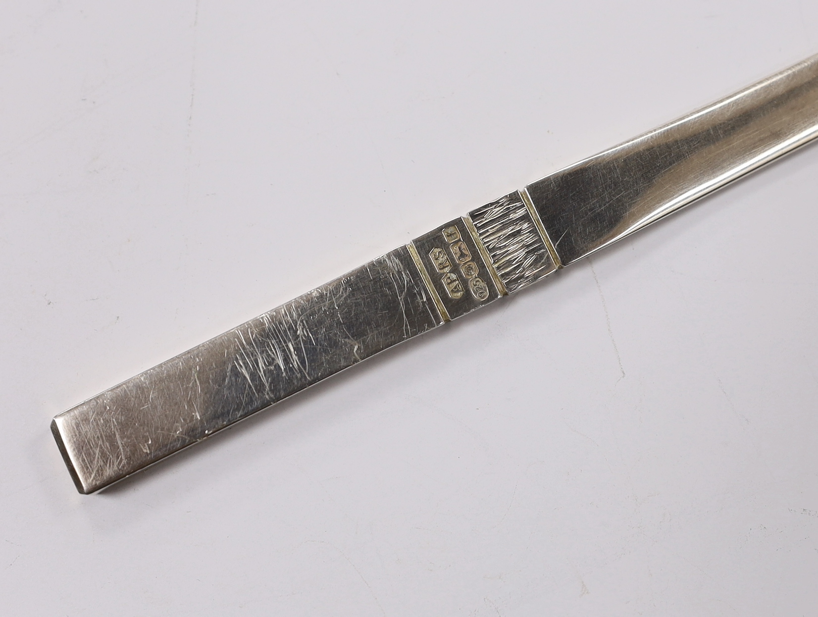An Elizabeth II part textured silver paper knife, by Pruden & Smith, Sheffield, 2005, 18.4cm, 46 grams, with original box.